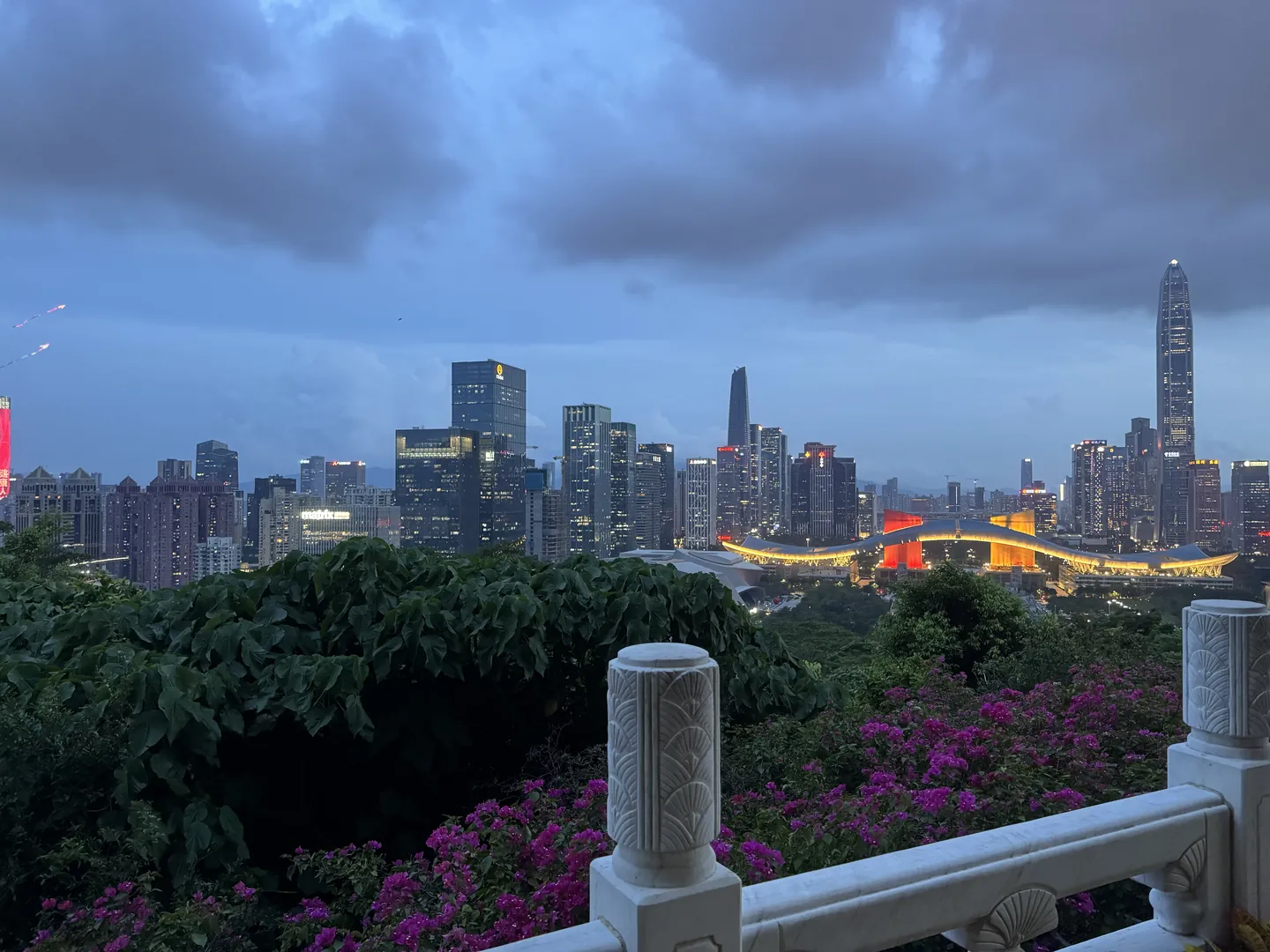 The Shenzhen skyline at dusk with the Civic Center lit up in front
