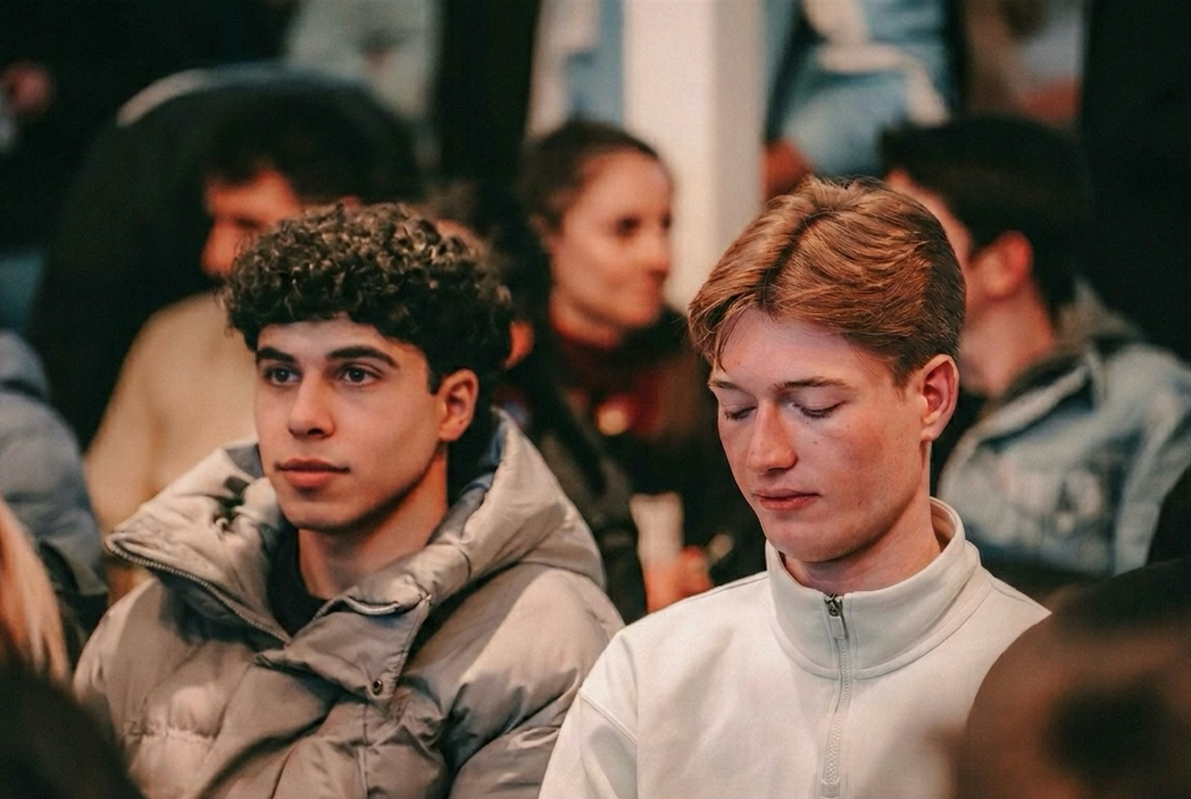 Attendees listening to a presentation during the hackathon