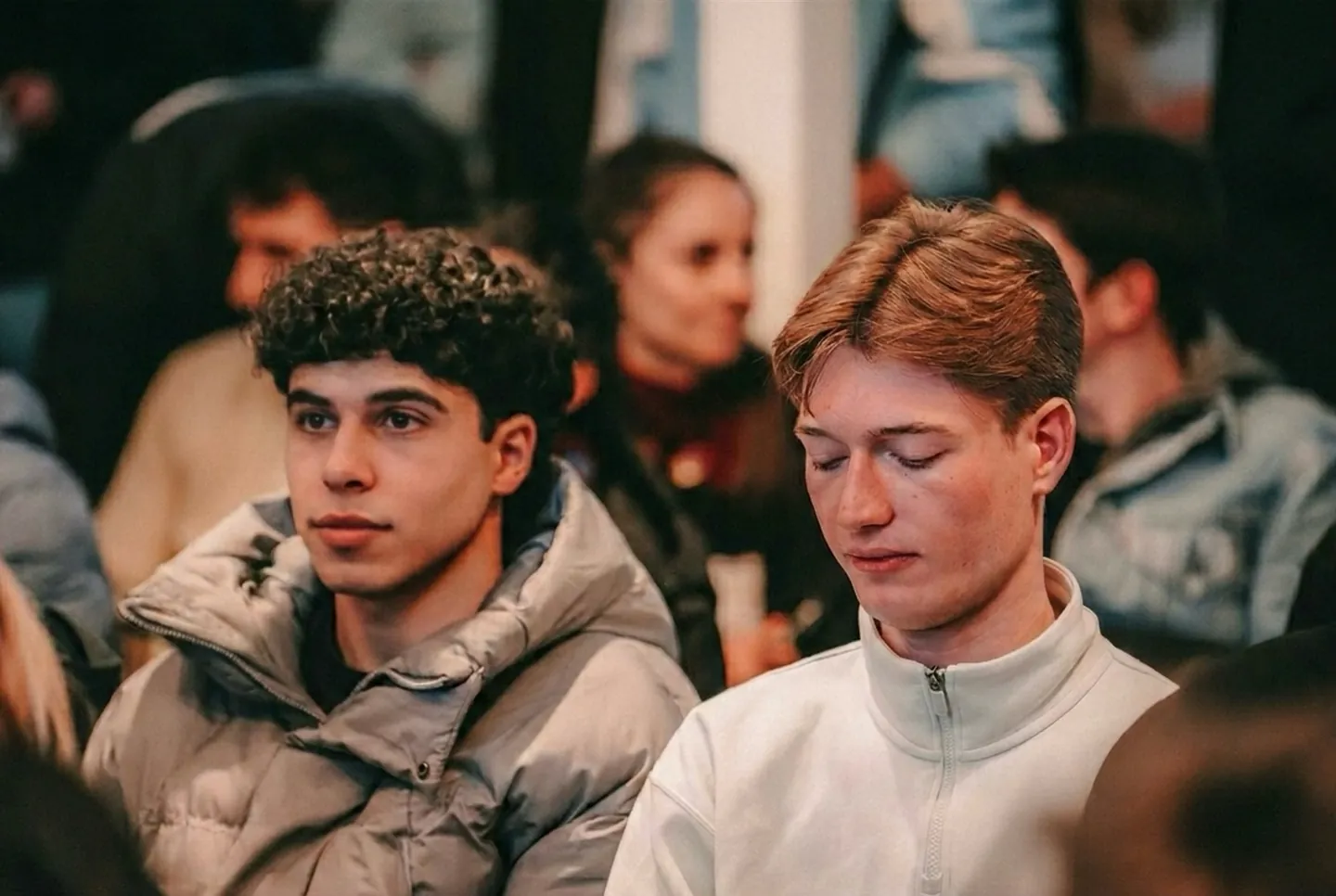 Attendees listening to a presentation during the hackathon